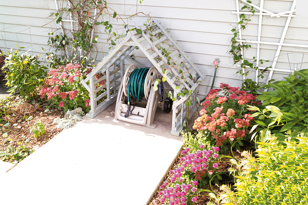 Latticed hose reel cover in a house shape, Handyman magazine,